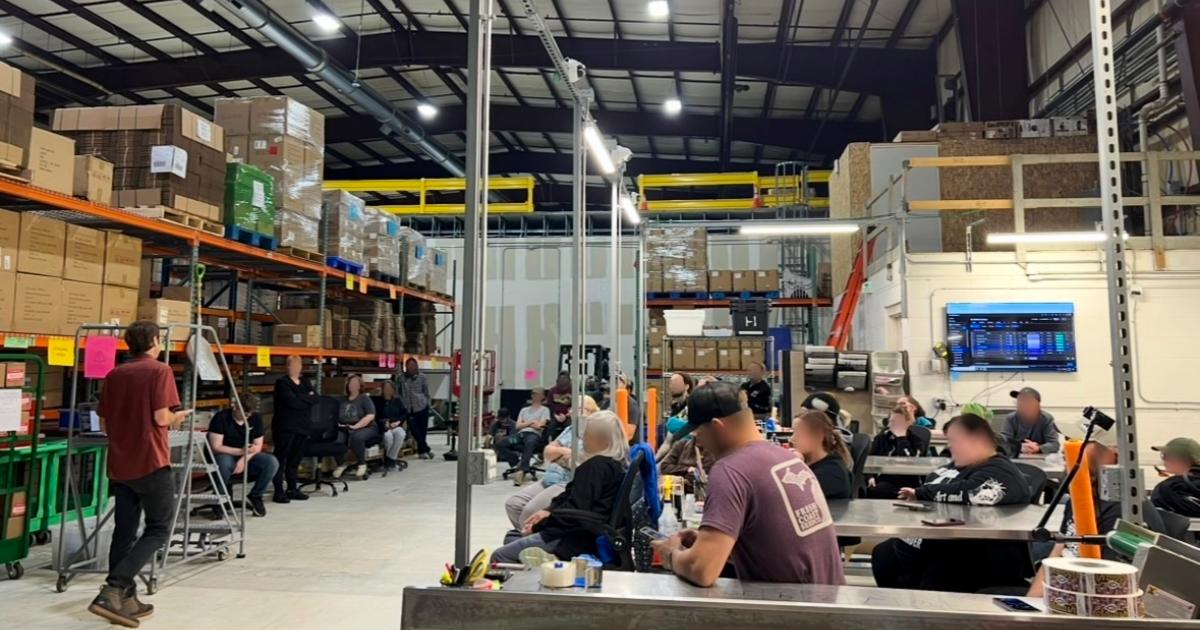 All-hands meeting on the manufacturing floor
